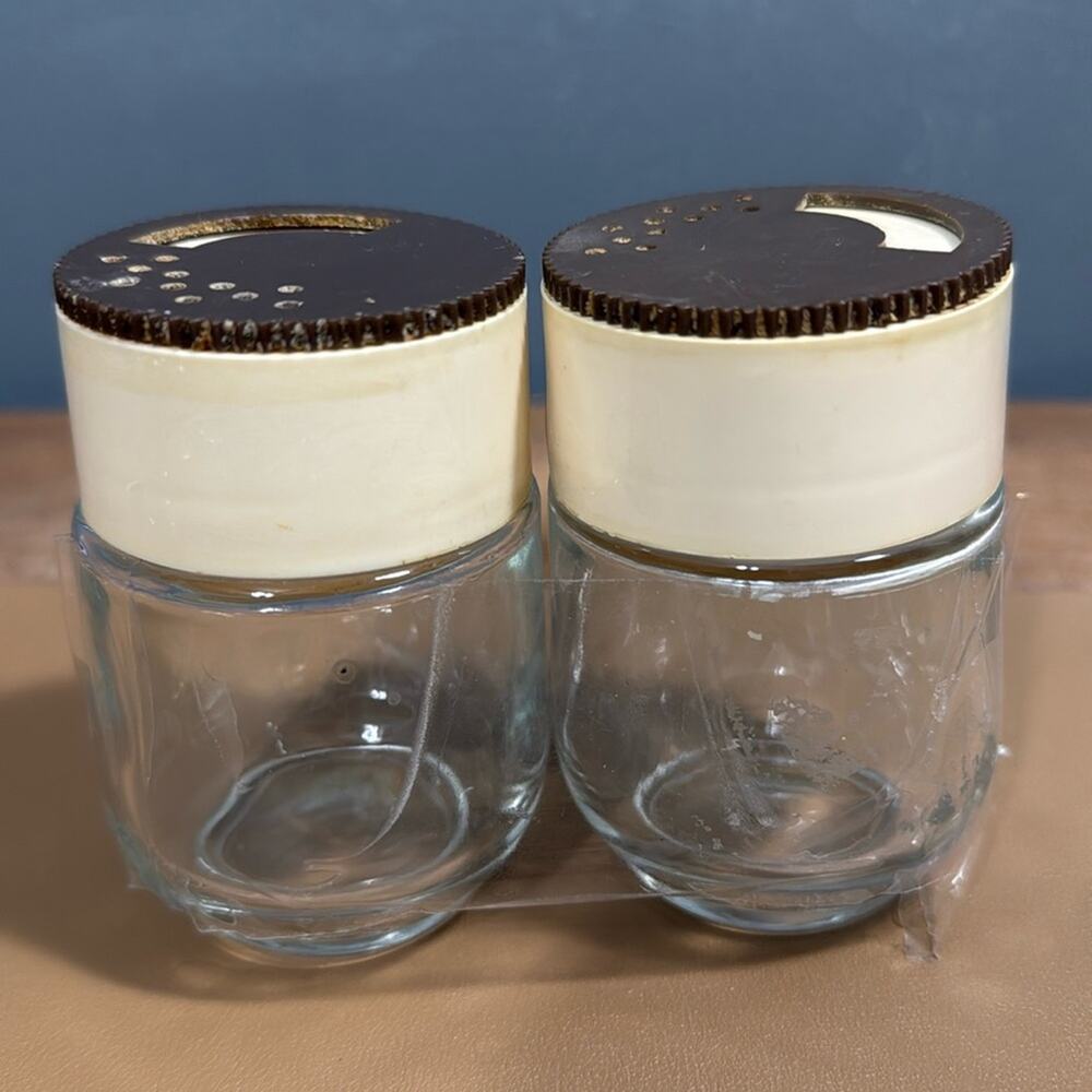 Vintage glass salt and pepper shakers spices turn top removable lids